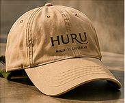 Sand-coloured cap with the HURU wordmark